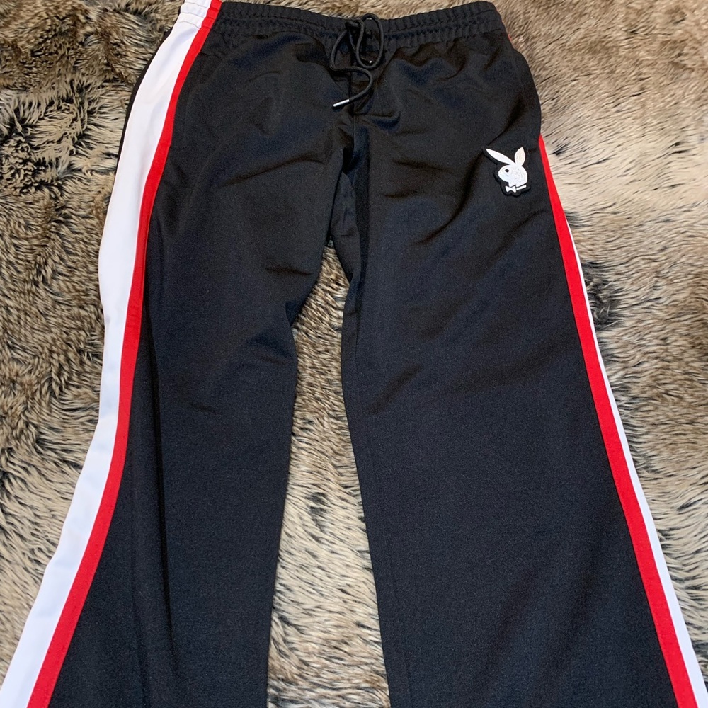 PacSun x Playboy black track pants.
Size M